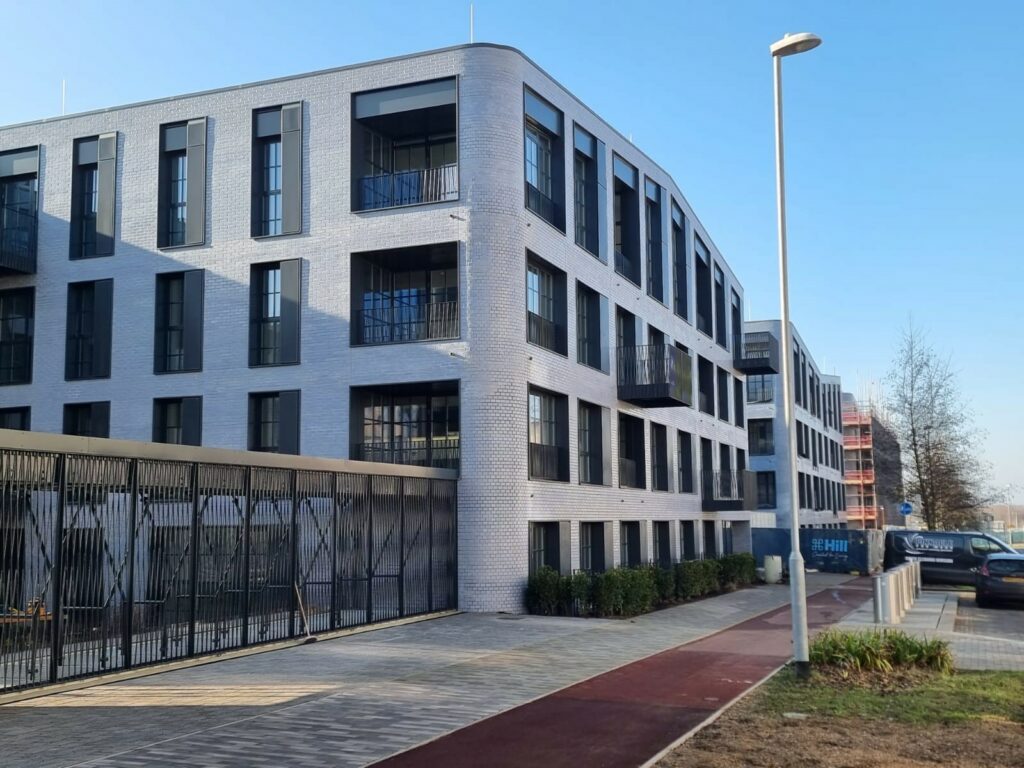 acoustic vents on each window of a medium rise block