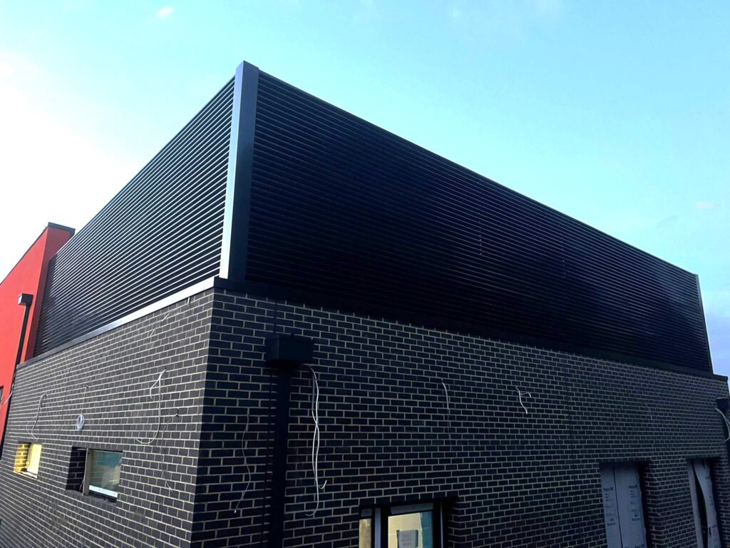 Gallery 98 Dark grey black aluminium louvres on a roof as screening