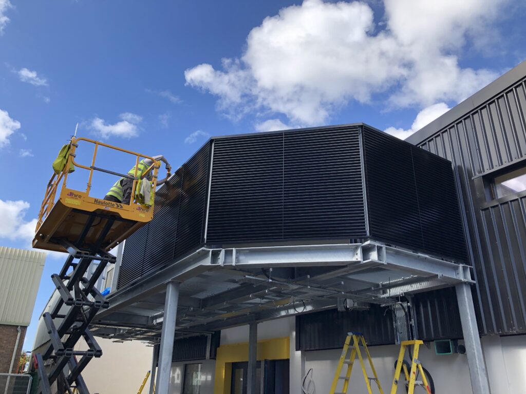 Gallery 102 Black Tek Louvres being installed